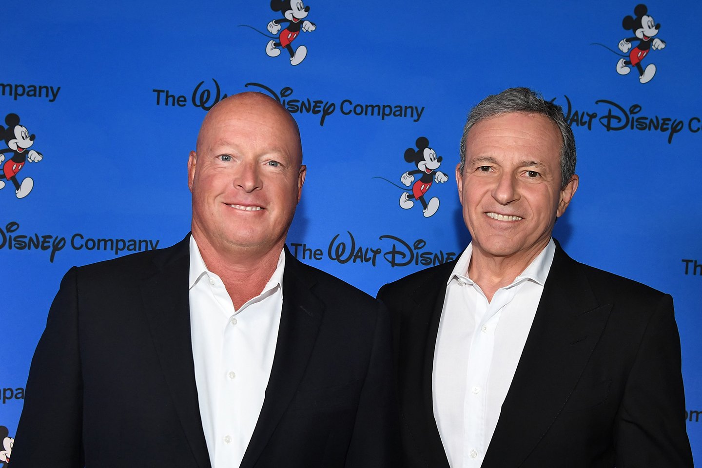 Bob Chapek and Bob Iger standing next to each other