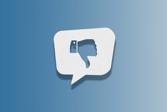 A social media icon of a thumbs down.