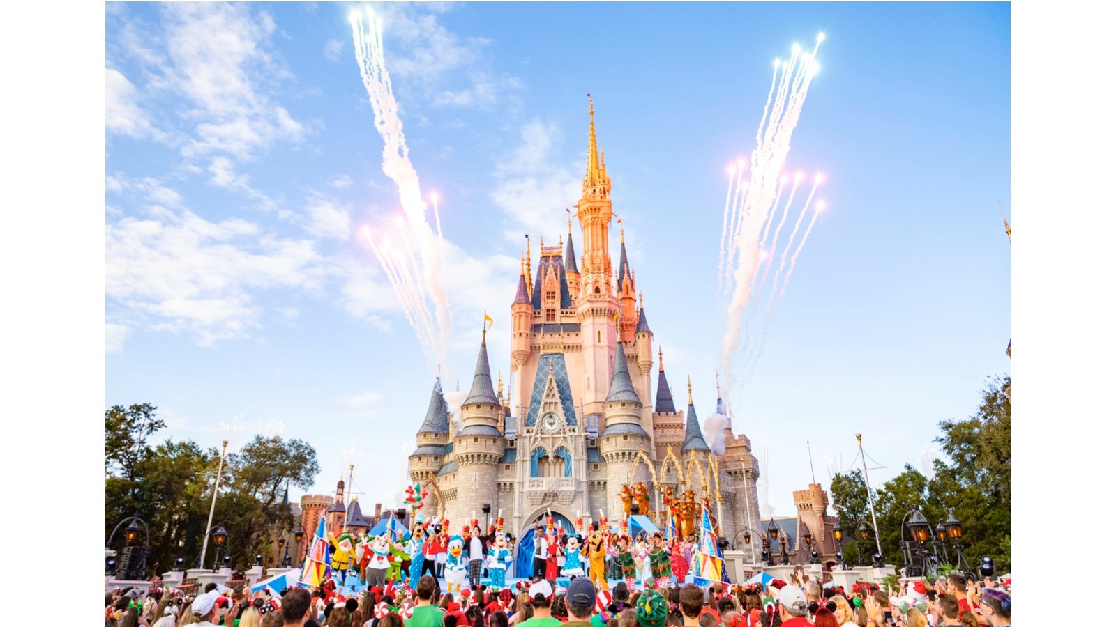 A crowd gathered at Disney's Cinderella Castle as fireworks are set off