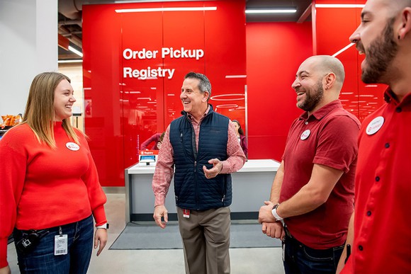 Target CEO Brian Cornell and workers.