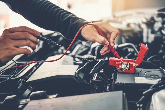 Man testing a battery charge