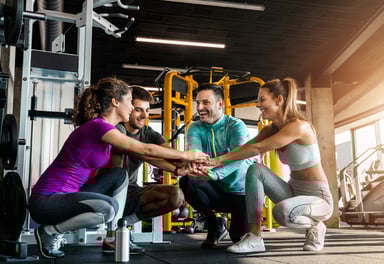 team putting hands together