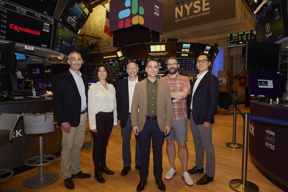 Slack executives at the New York Stock exchange on the day of the company's direct listing.