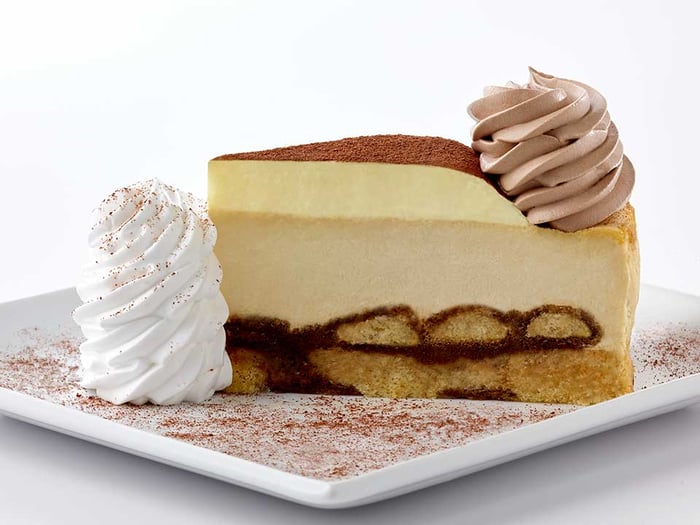 A piece of cheesecake sitting on a plate.