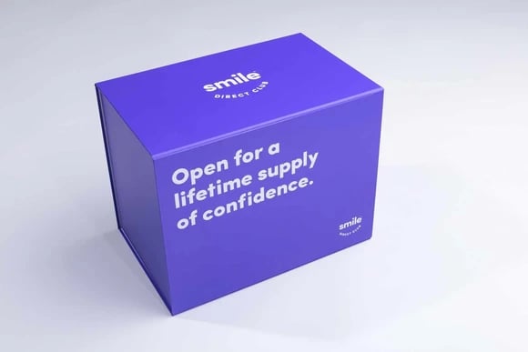 Purple box with SmileDirectClub logo and slogan.