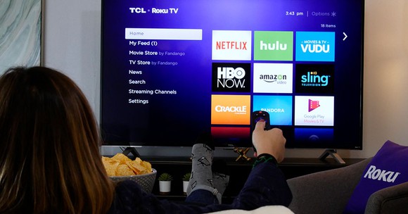 Woman watching the Roku Channel