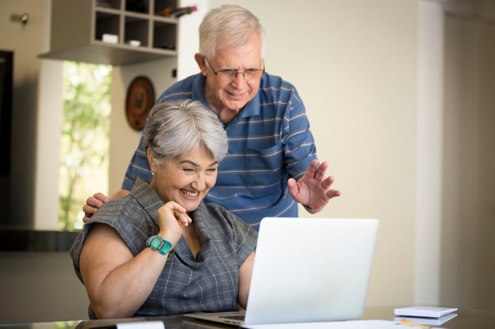 Older couple looking at computer