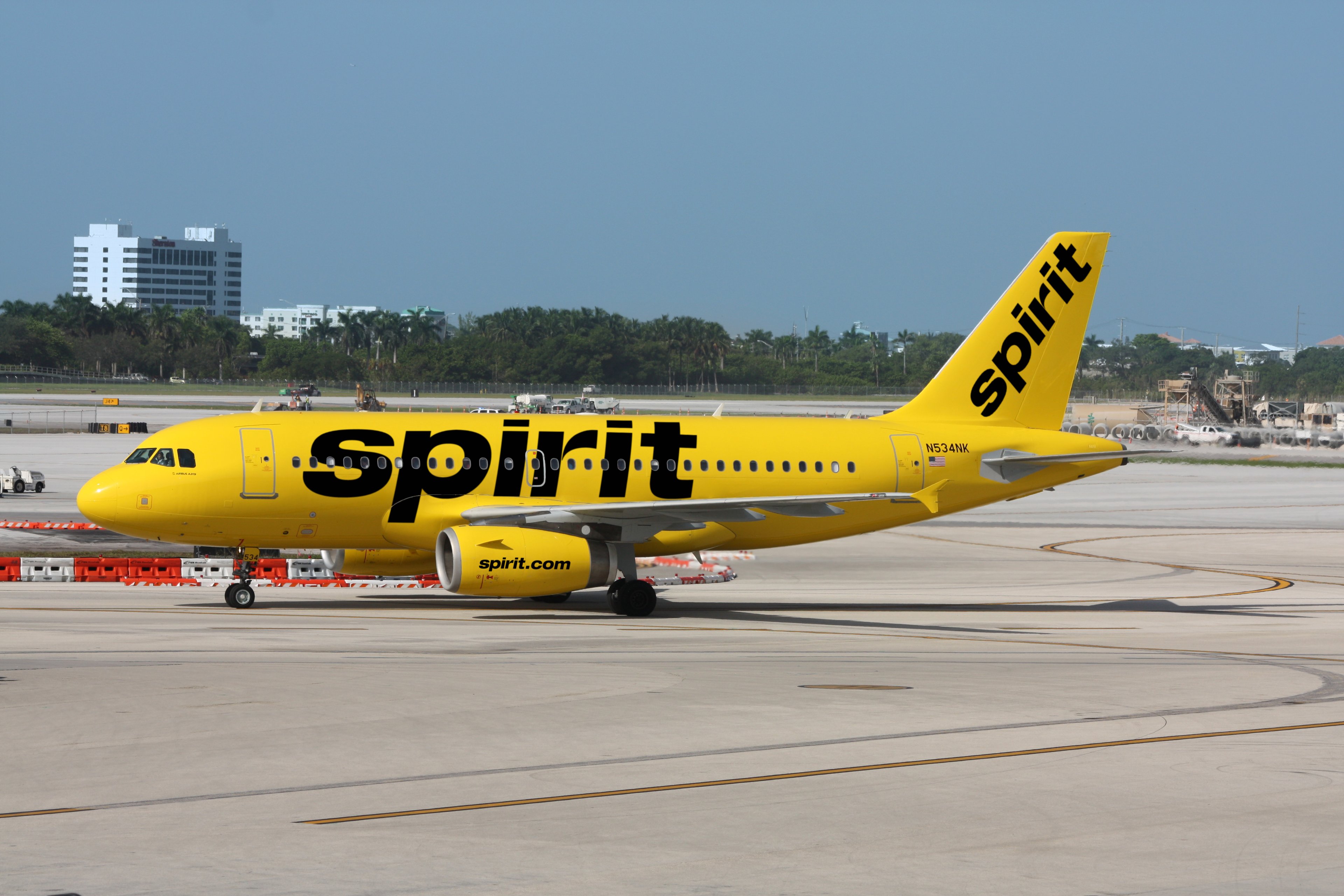 A Spirit Airlines jet taxing to the runway.