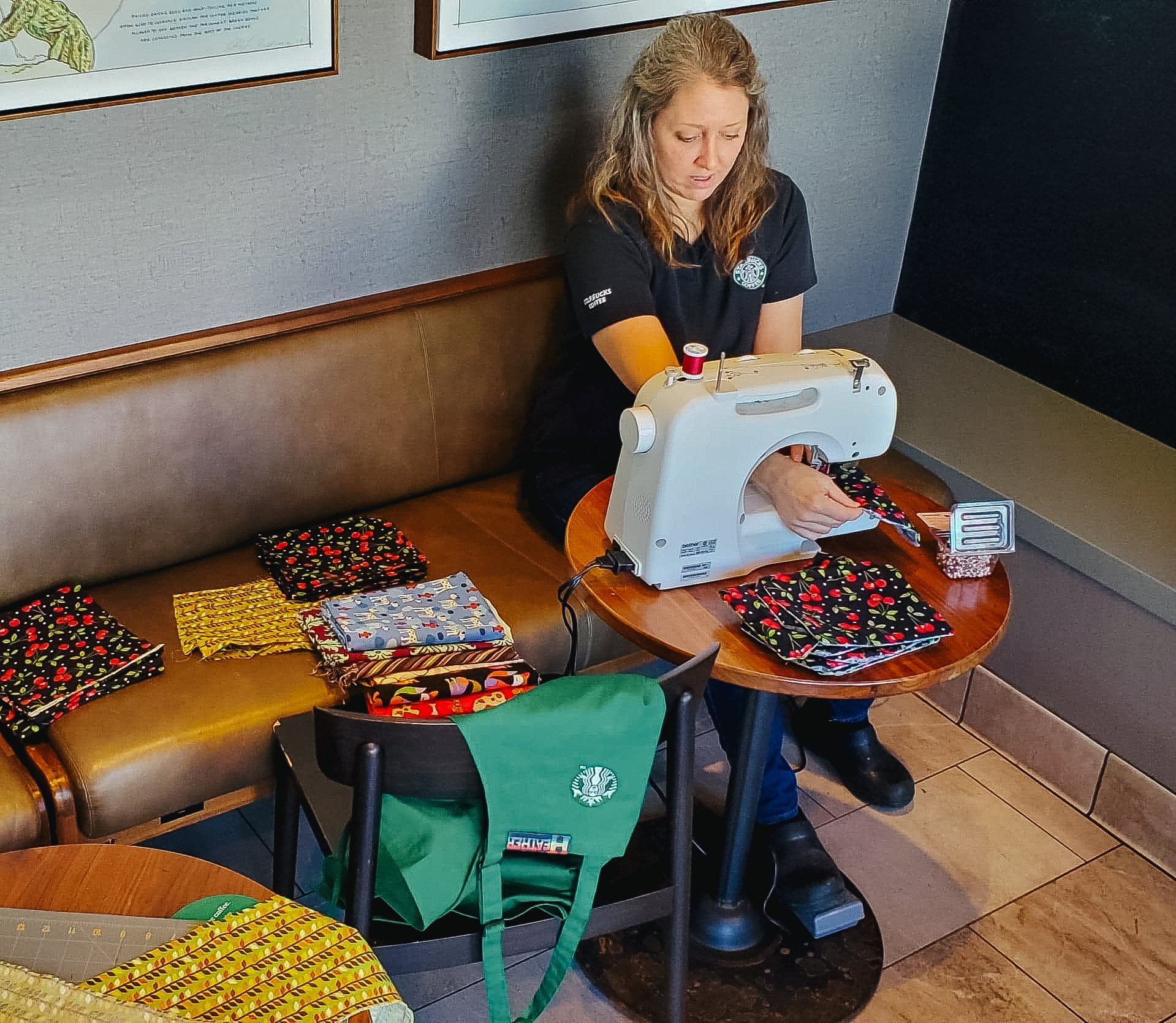 Heather Staples sews masks inside a Starbucks.
