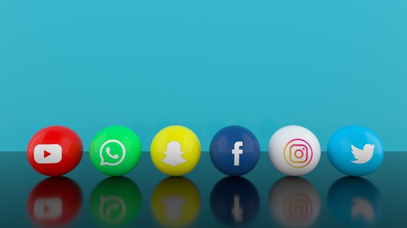 Social media icons on pool balls.
