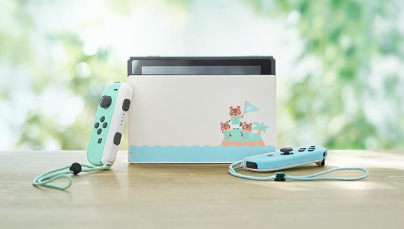 Nintendo Switch special edition themed after Animal Crossing, with three cute animals printed on the side of the hardware, which is colored in pale green and blue