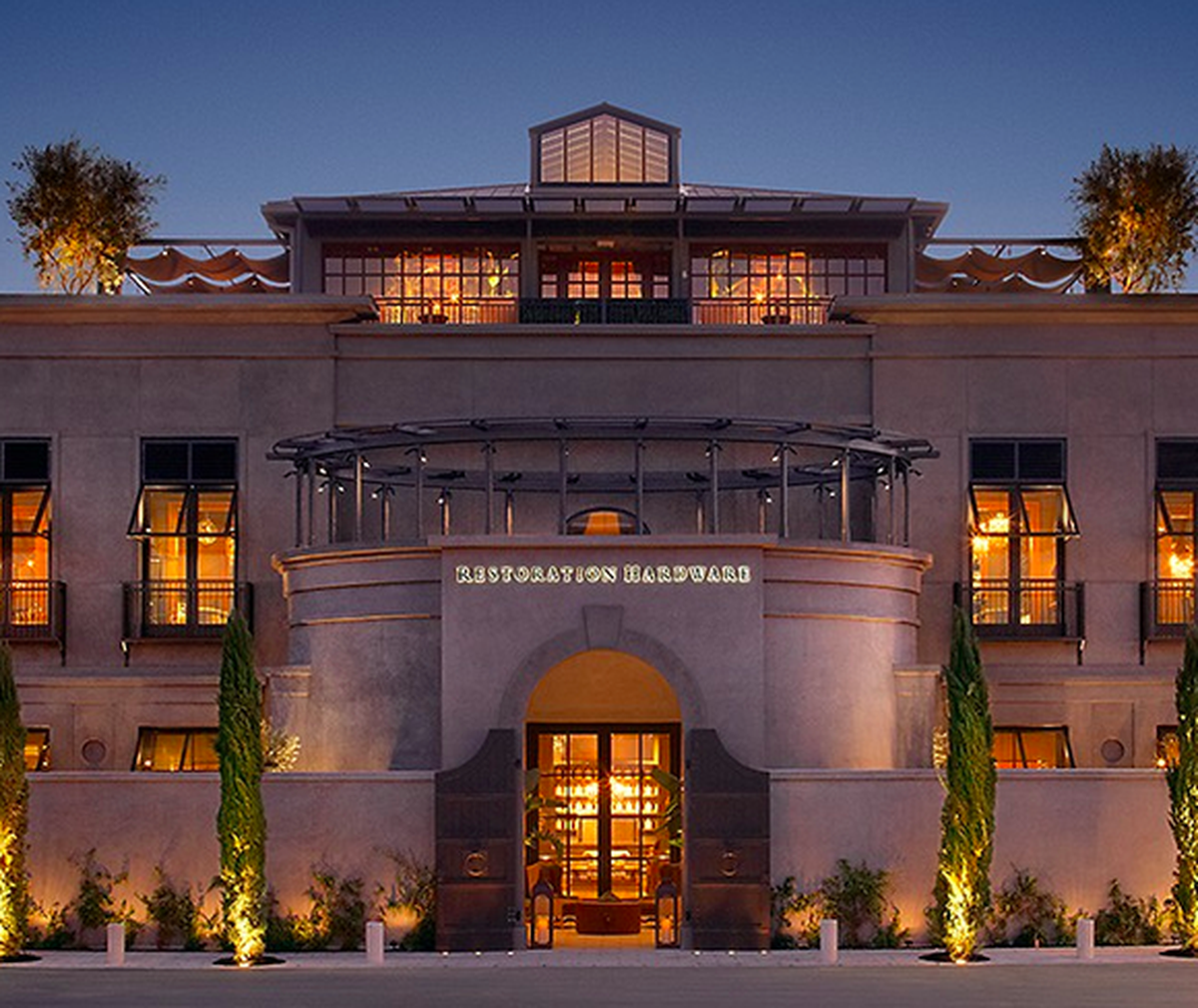 Three-story villa-looking storefront with Restoration Hardware signage.
