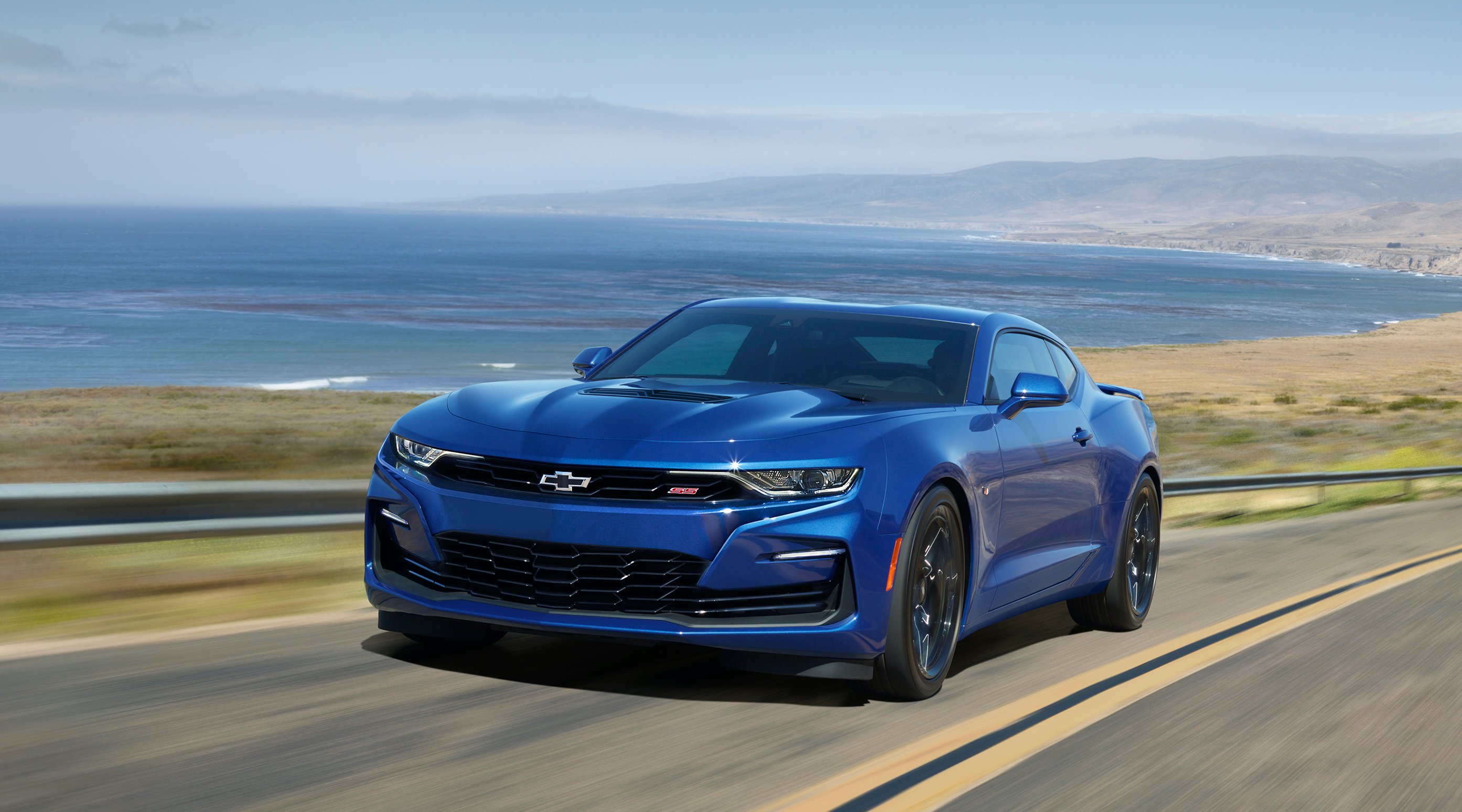 A blue 2020 Chevrolet Camaro SS, a two-door sports coupe.