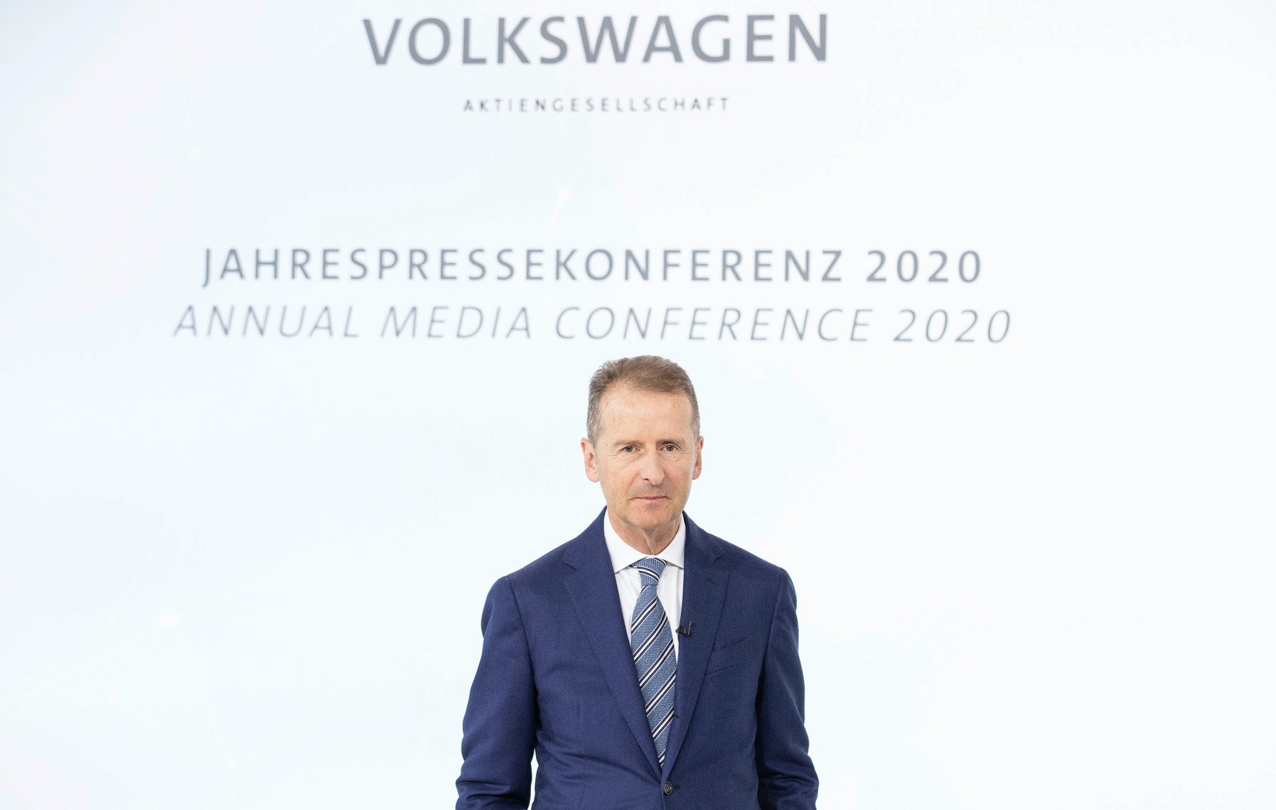 Diess is shown speaking at VW's annual conference in March 2020.
