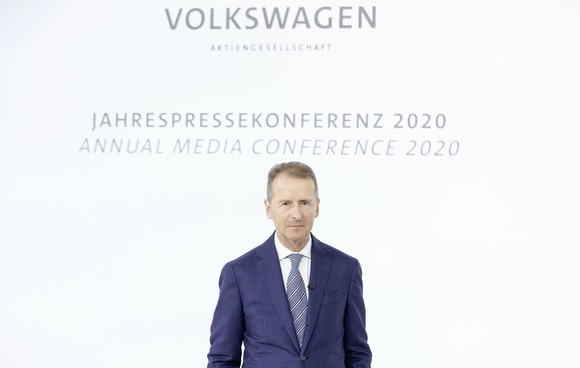 Diess is shown speaking at VW's annual conference in March 2020.