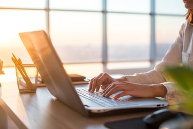 Woman typing on laptop_GettyImages-695137096