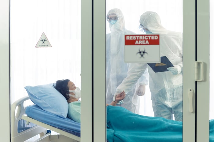 Patient and her doctors in a restricted area