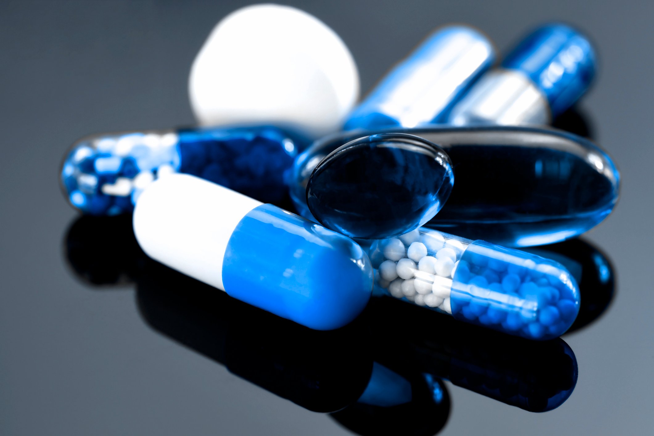 Blue and white capsules