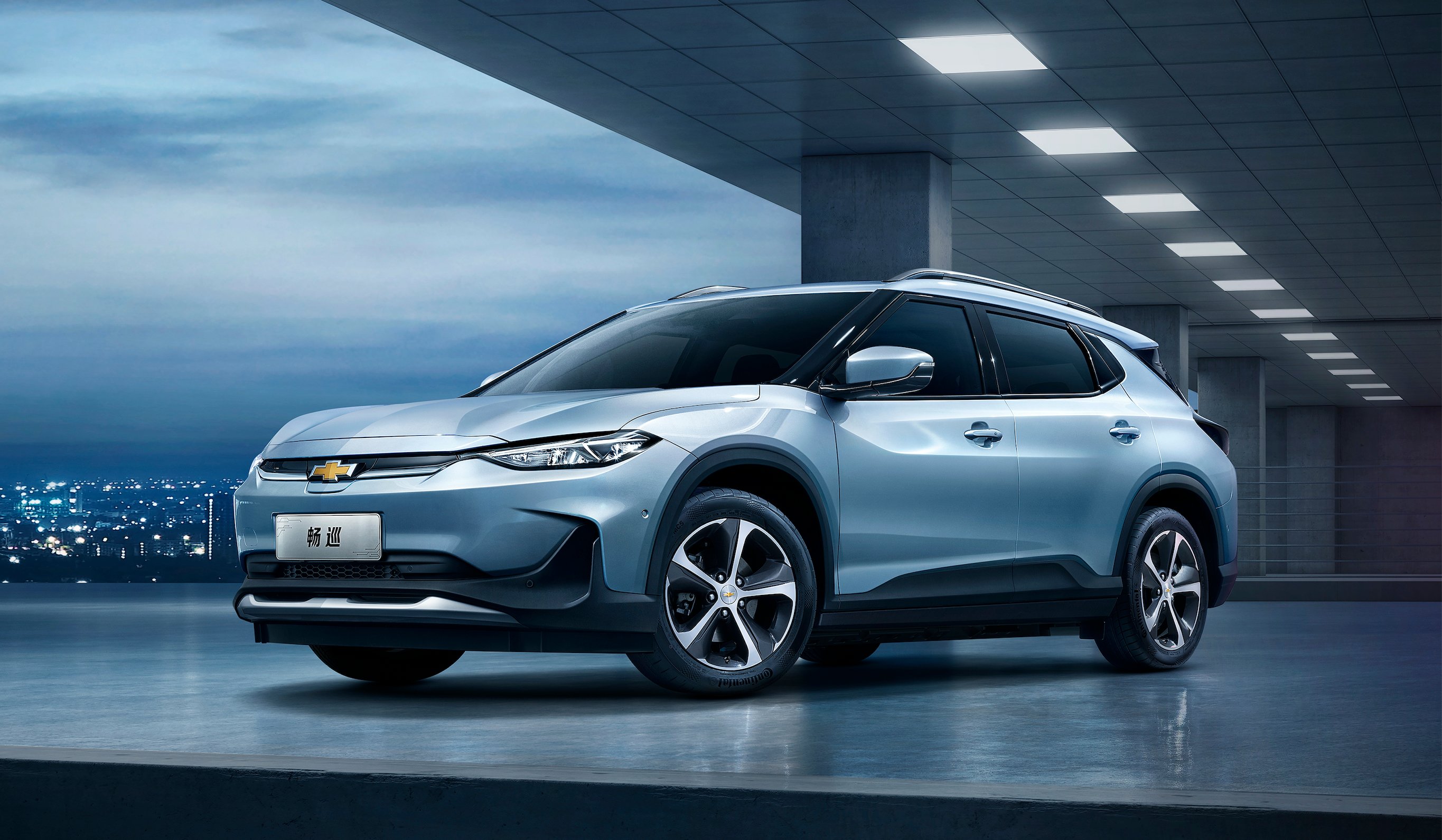 A blue Chevrolet Menlo EV, a small electric crossover SUV