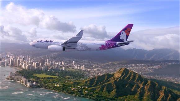 A Hawaiian A330 flies over DiamondHead.
