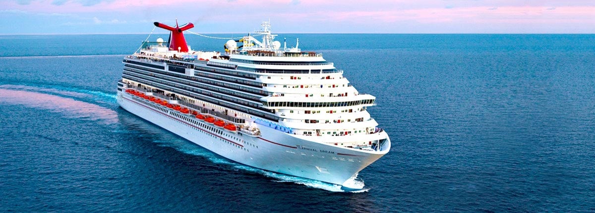 A Carnival Dream cruise ship on the water.