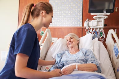 nurse-senior-patient-hospital-bed-getty
