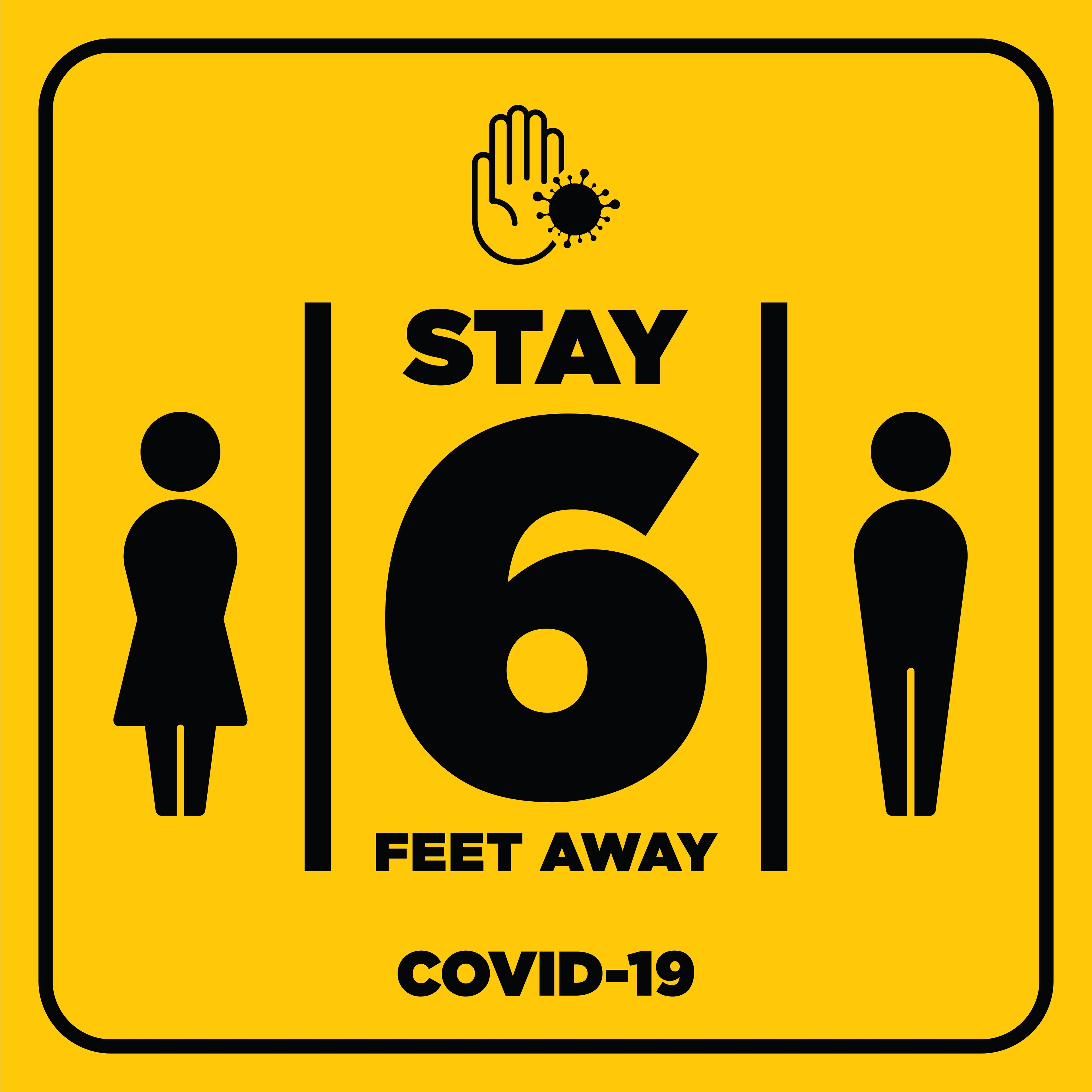 A sign that says stay 6 feet away and COVID-19