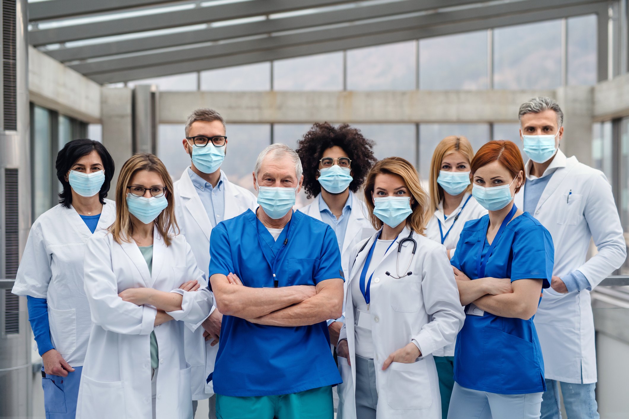  A group of healthcare workers are wearing masks.