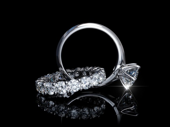 A diamond wedding ring and engagement ring.