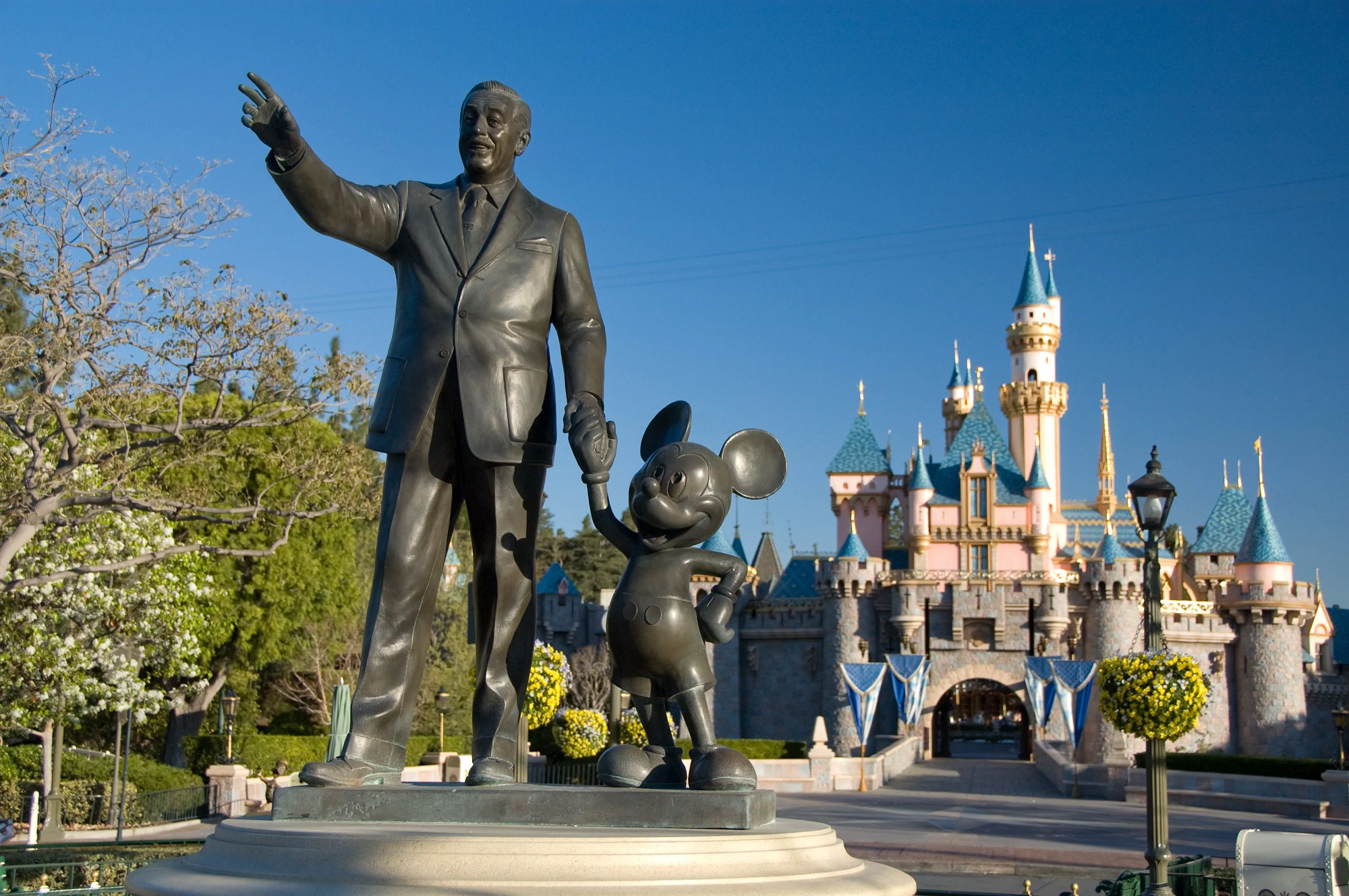 A statue of Walt Disney and Mickey Mouse.