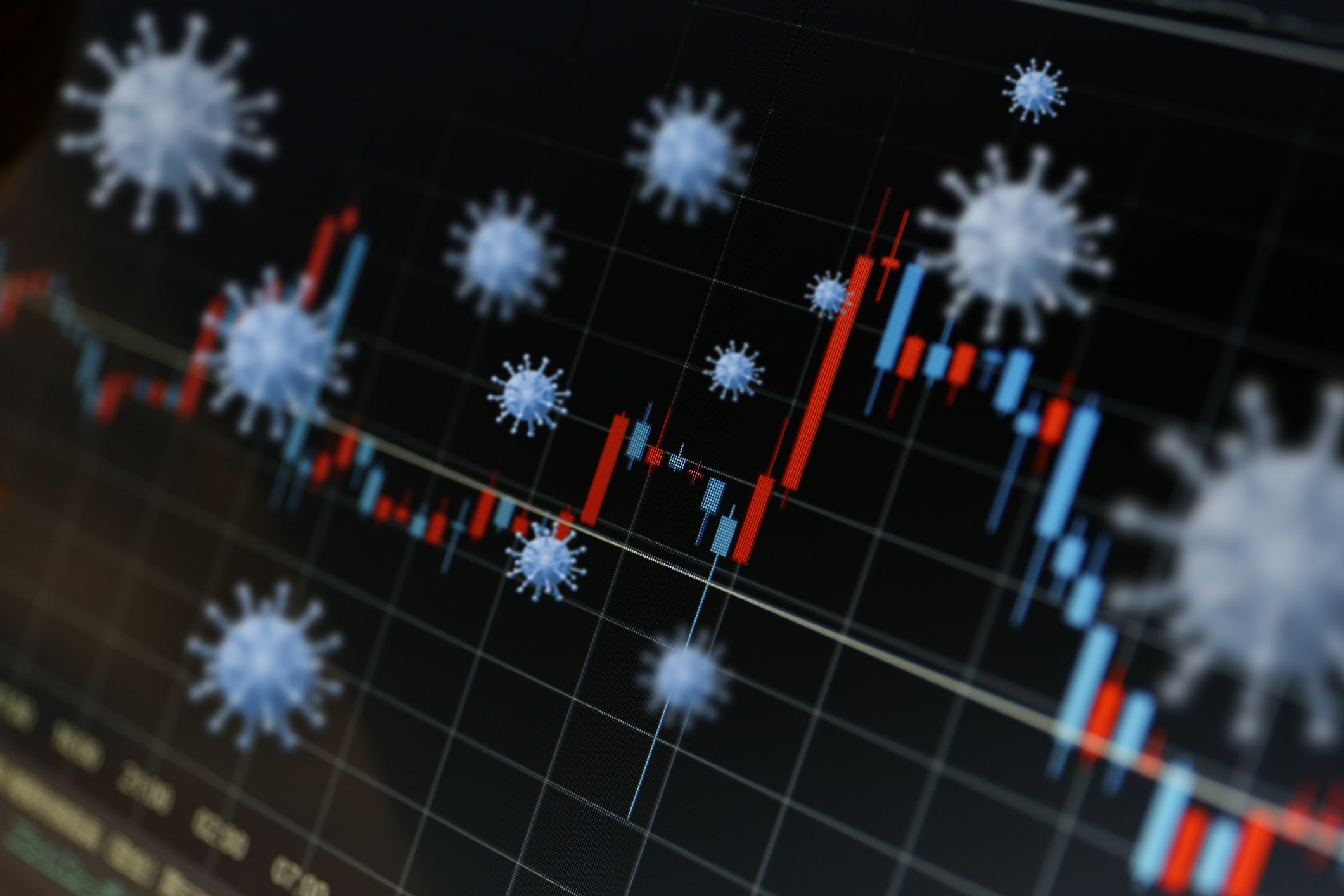 A stock chart with illustrations of floating viruses in the foreground.