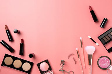 Cosmetics on pink table