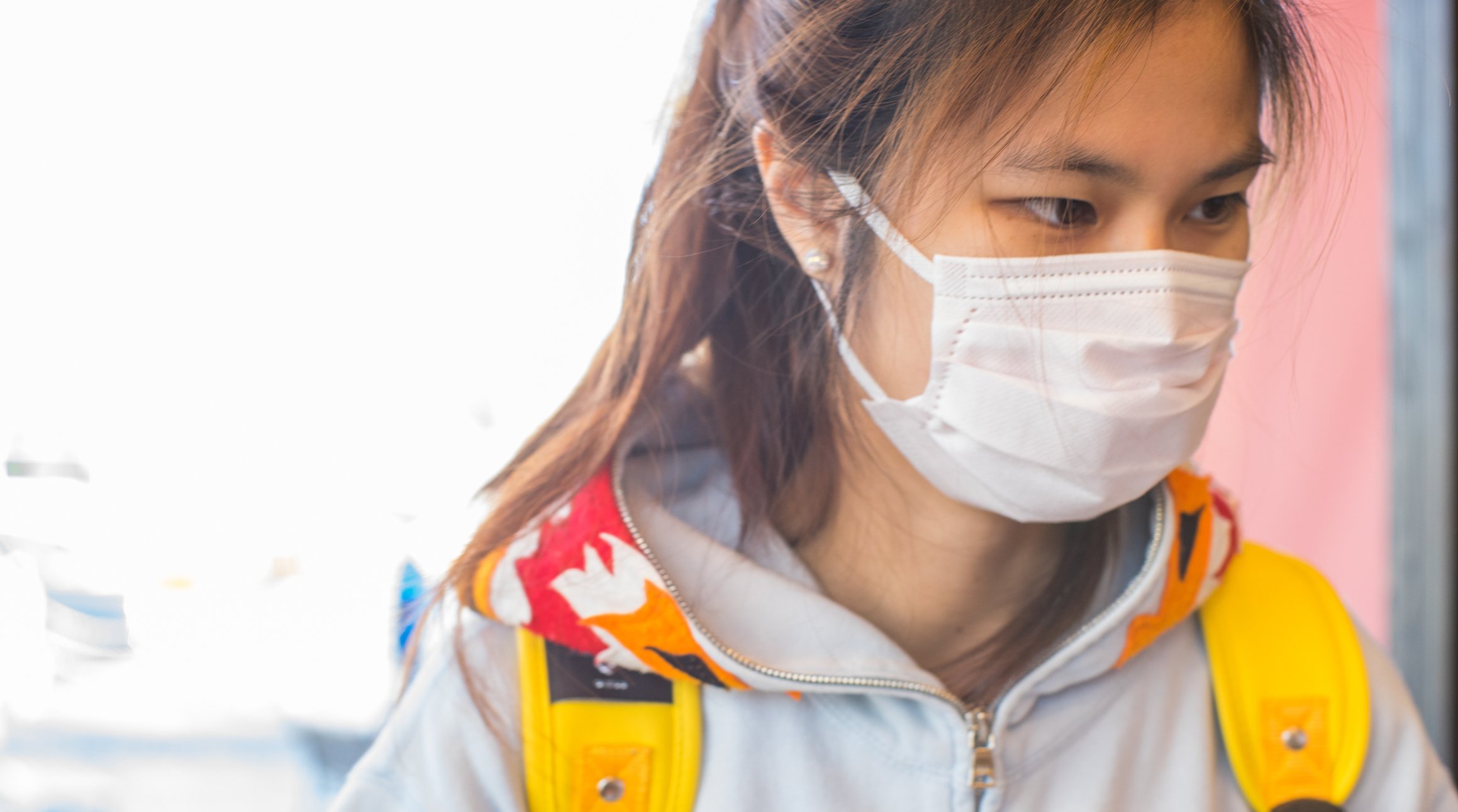 Woman first responder wearing protective mask
