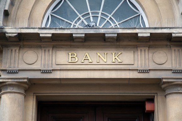 a building facade with the label bank on it