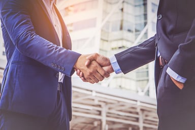 Two businessmen shaking hands