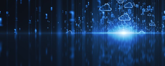 A blue background with a computer glare on the ground beaming up to several clouds. 