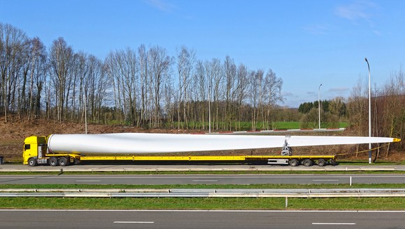 truck transporting large wind turbine blade