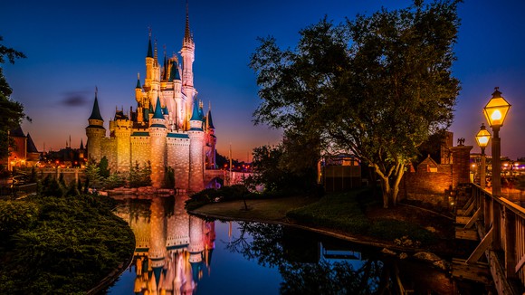 The Magic Kingdom castle with dusk setting in.
