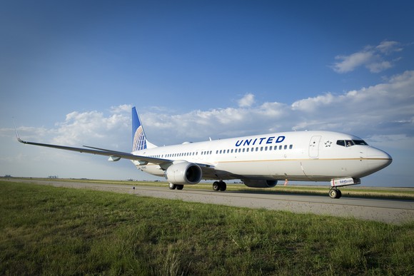 A United Airlines plane taxiing to the runway.