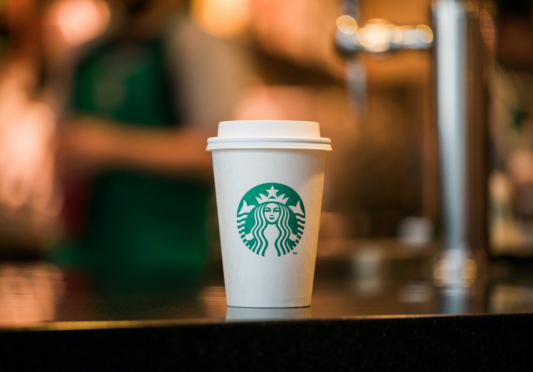 A Starbucks coffee cup.