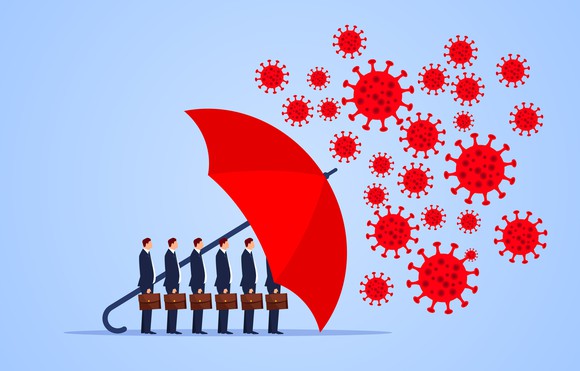 A line of businessmen under a red umbrella defending against the COVID-19 virus.