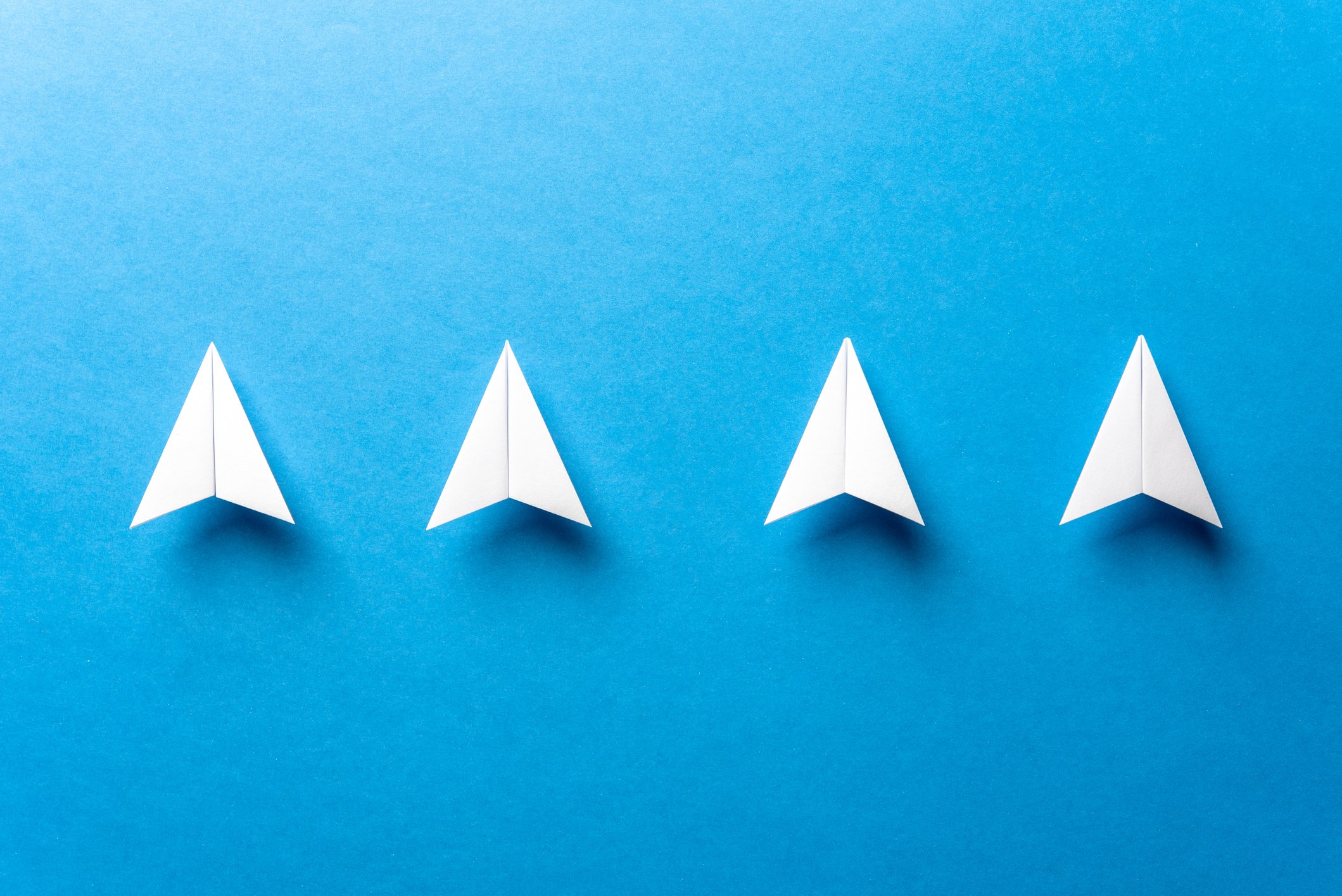 Four arrows pointing up