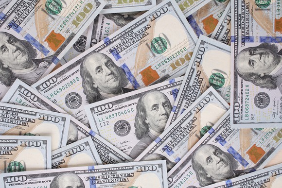 Loose pile of hundred-dollar bills