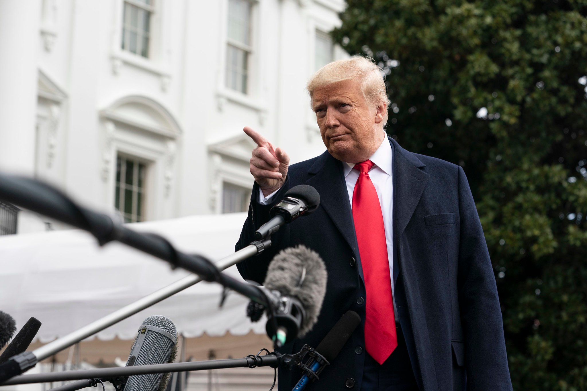 President Trump speaking with reporters from the White House lawn. 
