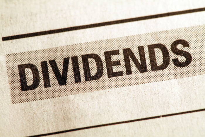 The word Dividends printed as a newspaper headline.