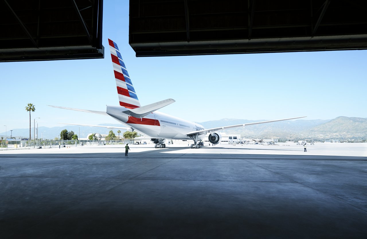 An American Airlines jet leaving the hanger.