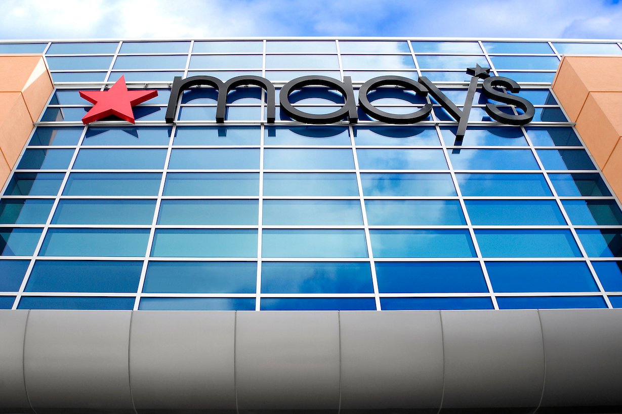 A Macy's sign on the outside of a store.