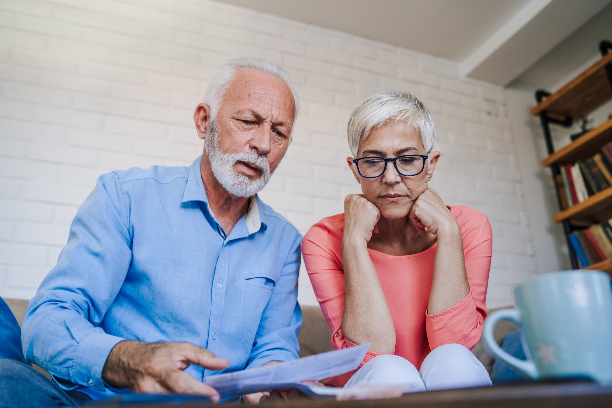 Older couple budgeting.