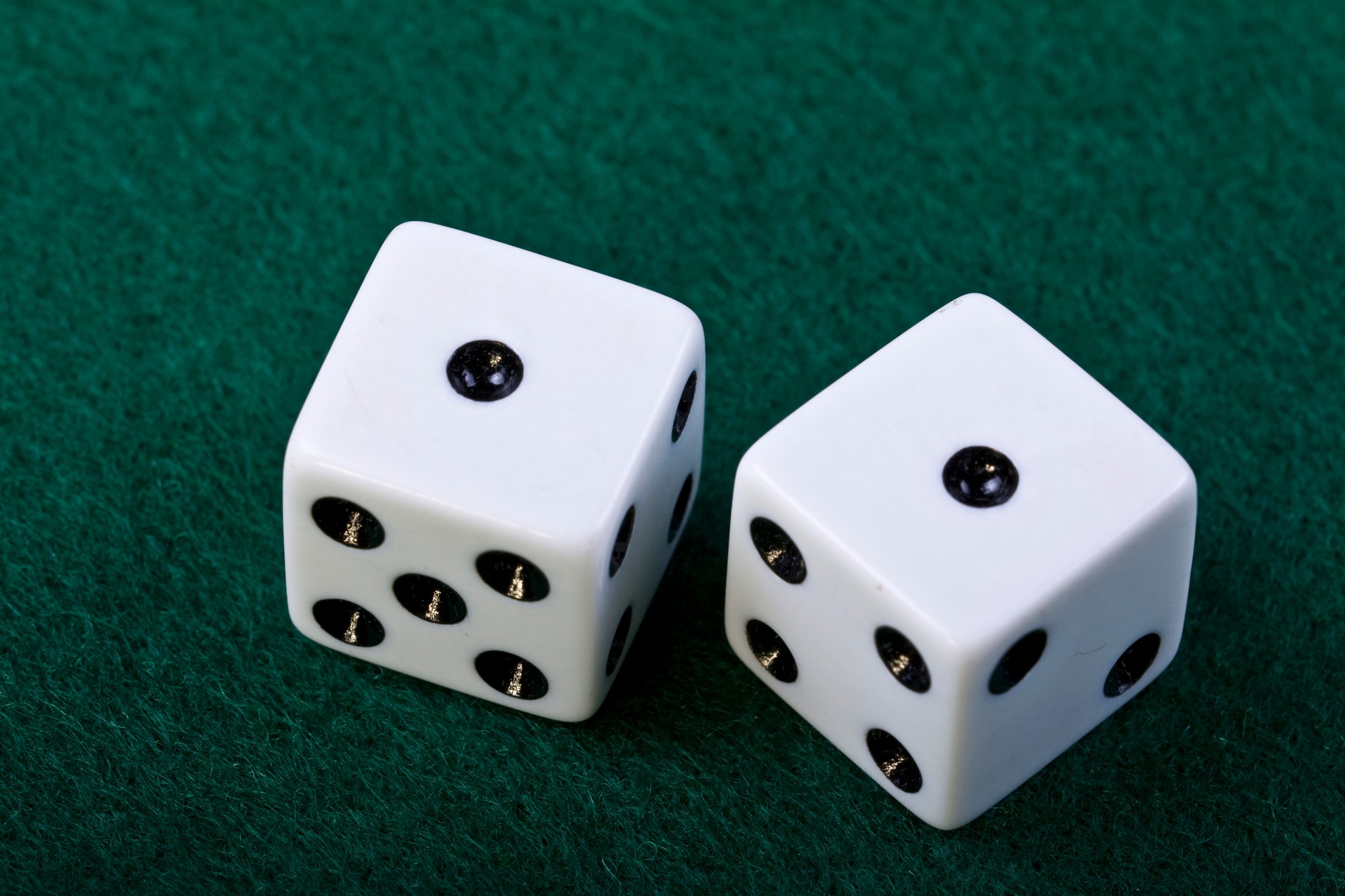 Pair of dice showing two ones.
