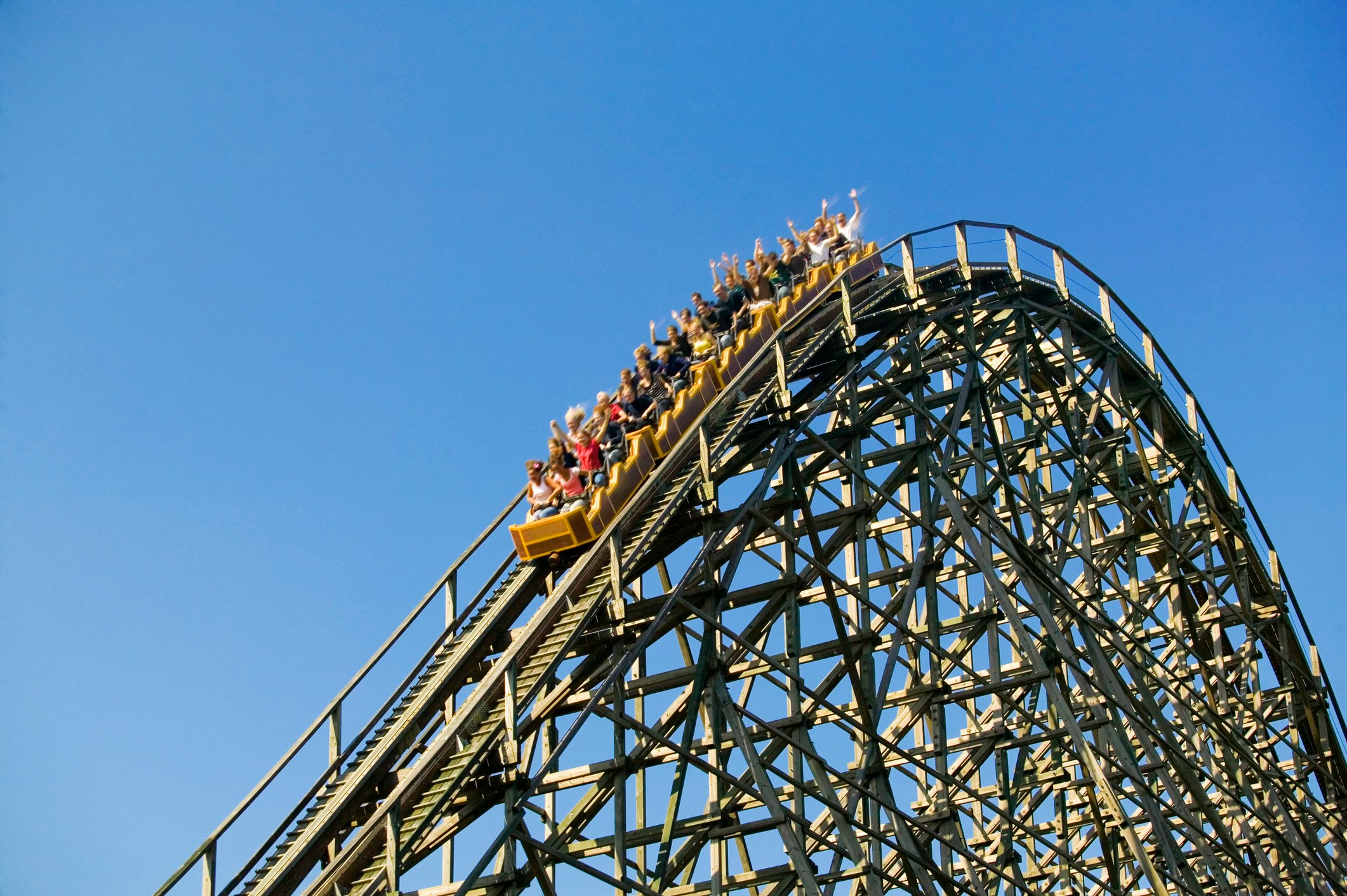 A roller coaster heading lower.